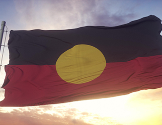  The Aboriginal Flag against a sunset